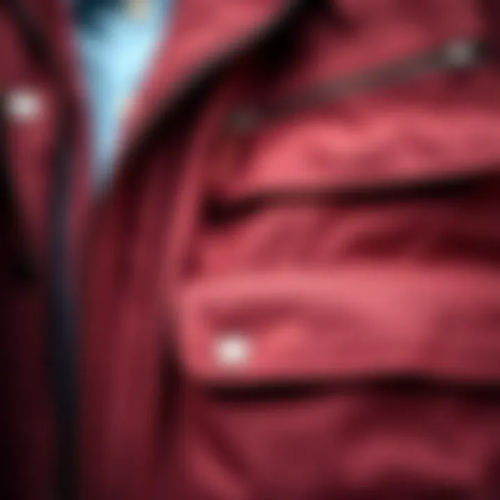 Close-up of a jacket showing multiple functional pockets with zippers and buttons